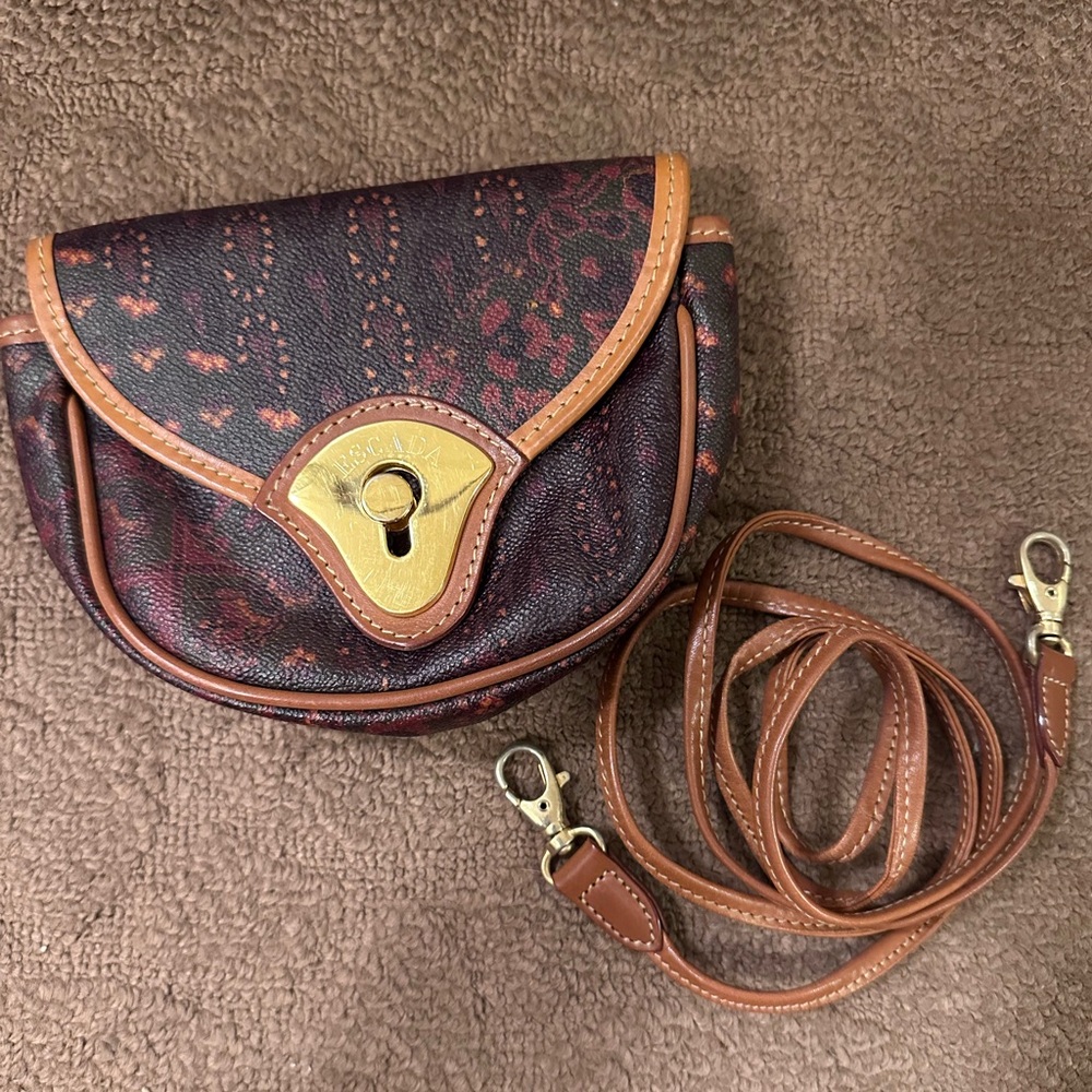 Preloved Authentic Escada micro purse with detachable strap. very good condition